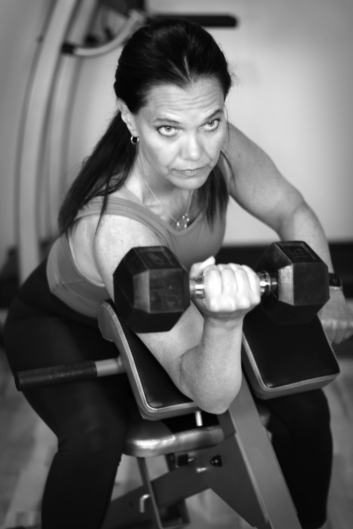 Anita coaching strength training with dumbbells